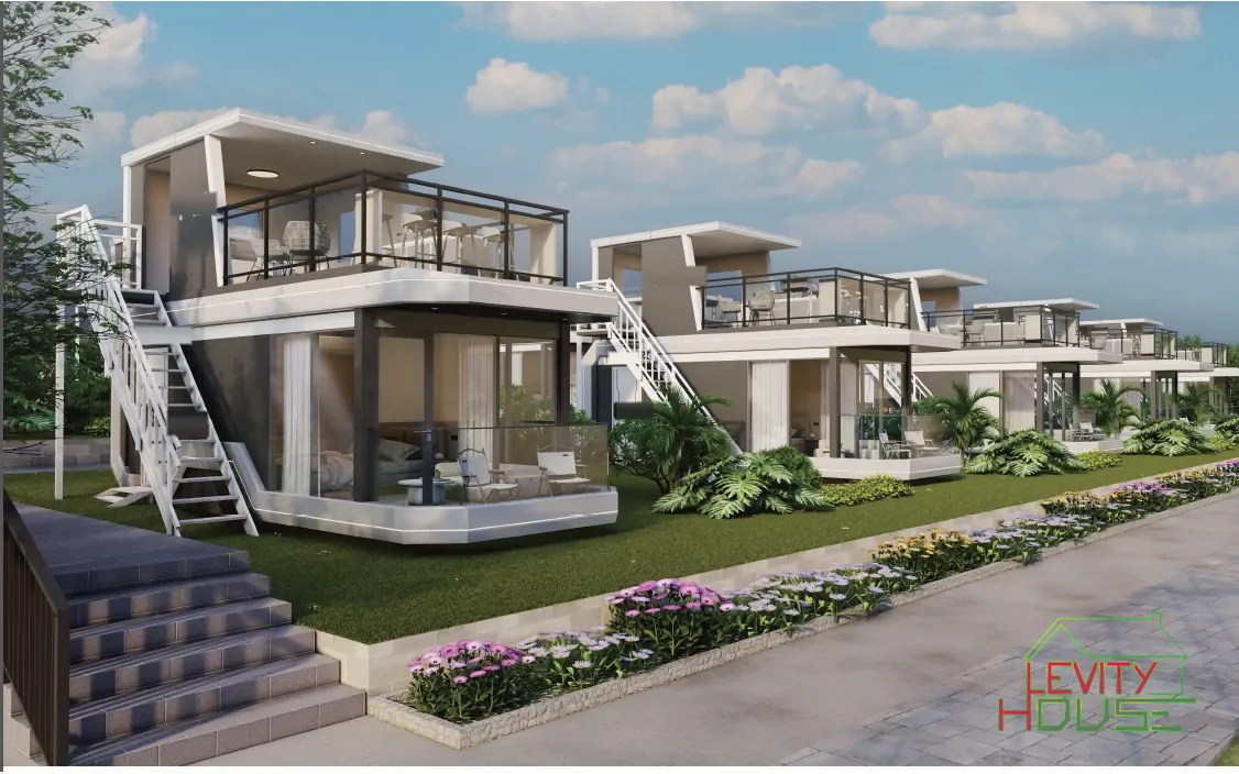 Unità Levity House affiancate lungo un viale, con terrazza superiore e scala esterna